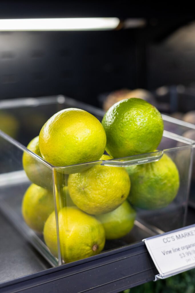 pears sitting on farm market refrigerated shelf